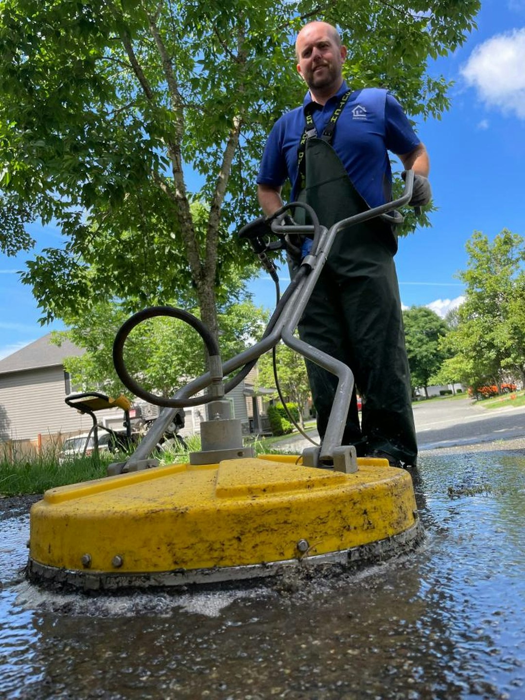 a-man-standing-next-to-a-yellow-fire-hydrant-3kt7f9zrse